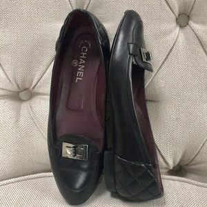 CHANEL Quilted Turn Lock Leather Flats